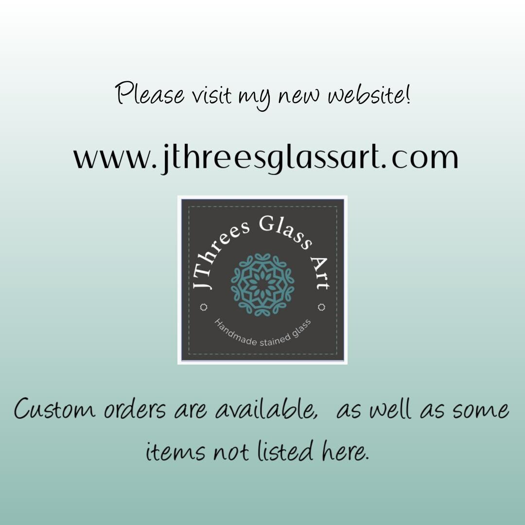 Wells College Ornament: Black & Gold Stained Glass 'W' Logo