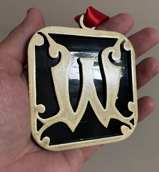 Wells College Ornament: Black & Gold Stained Glass 'W' Logo